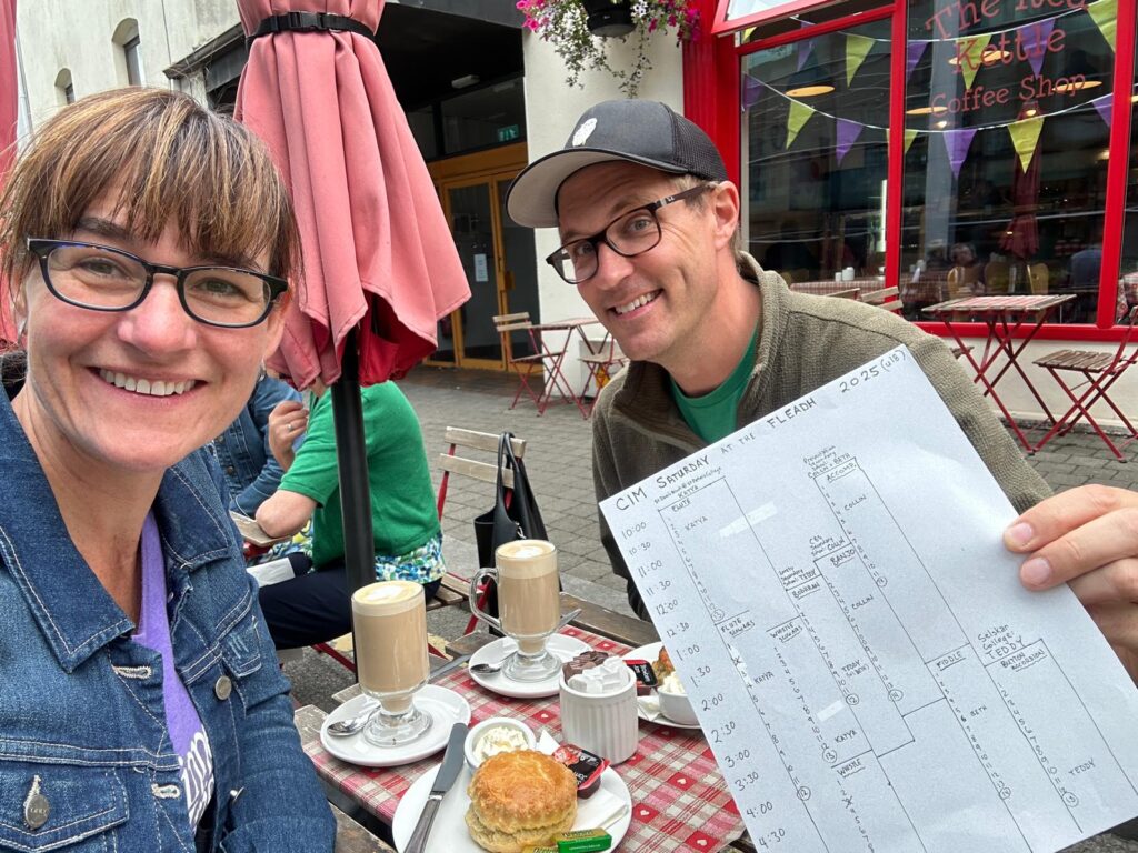 Norah and I planning our first day of competitions over coffee and scones.