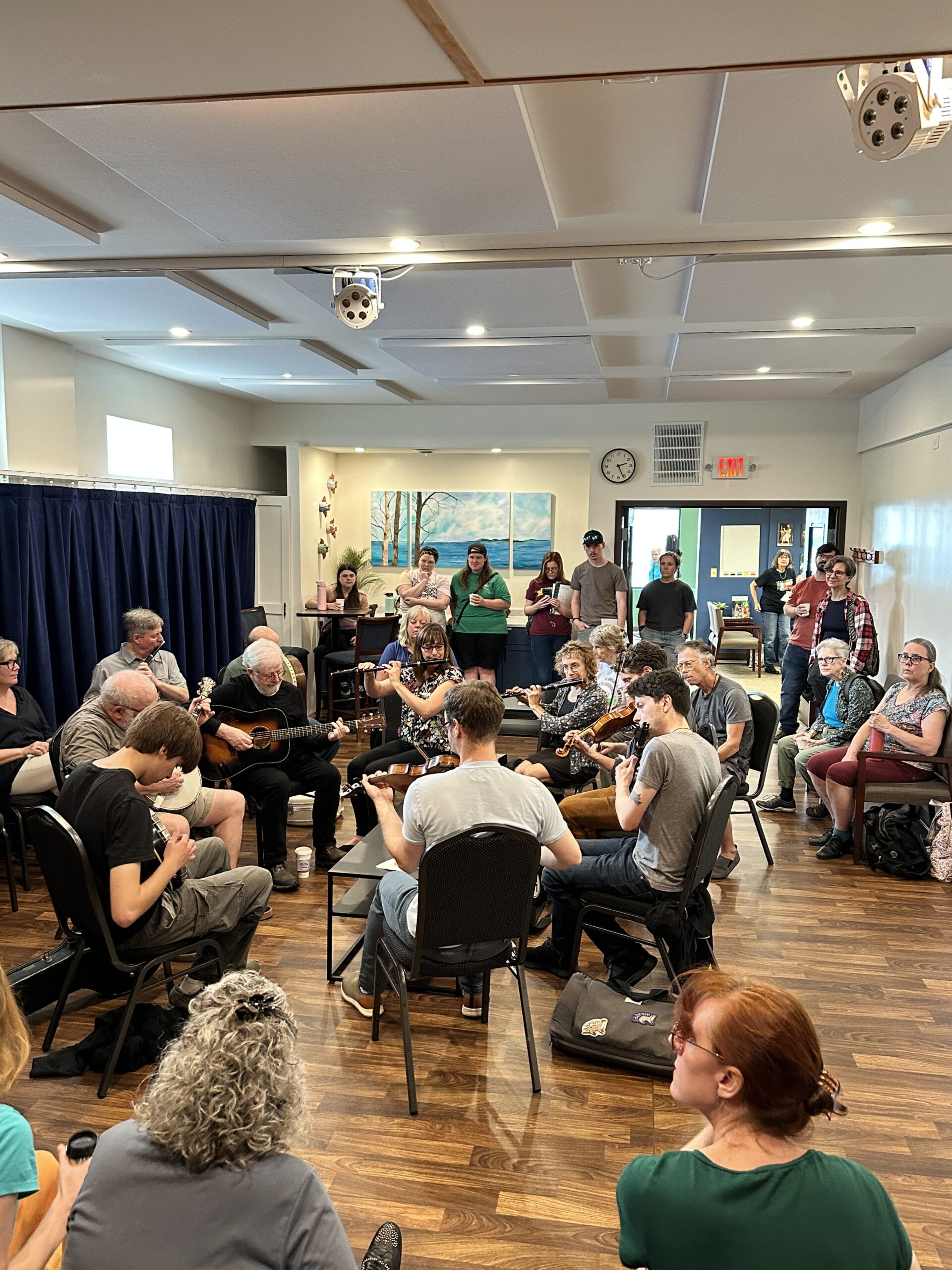 Participants and community members enjoying the music session between workshops. (Galena St. Croix)